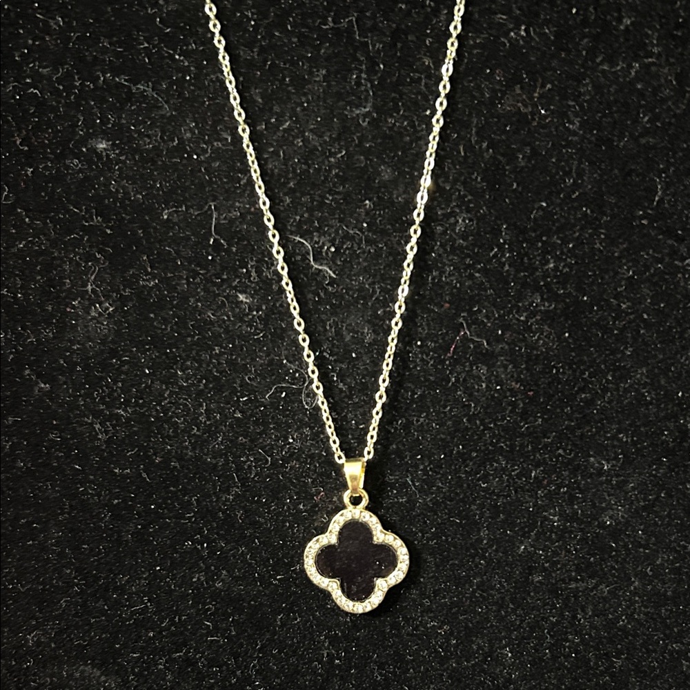 Elegant Black and Gold Clover Necklace